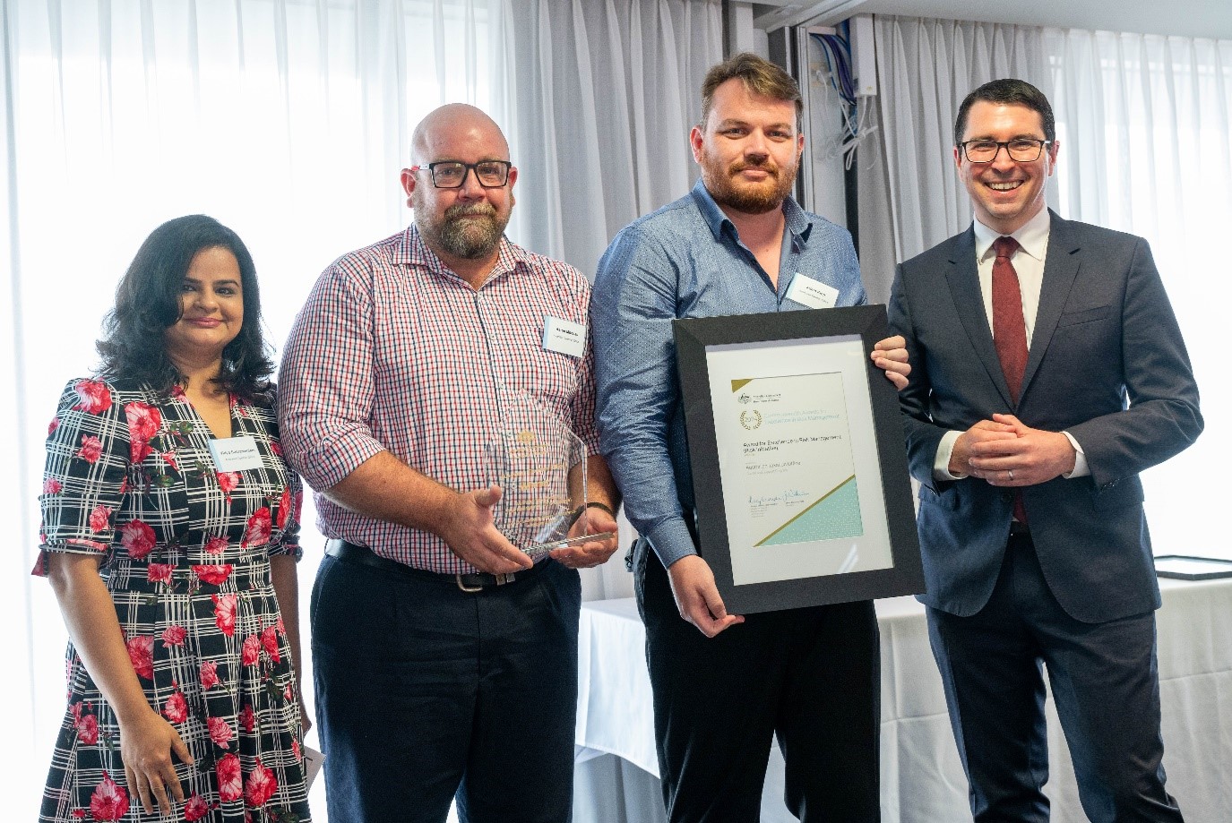 Photograph of the representatives from the Australian Taxation Office with the Hon. Patrick Gorman. 